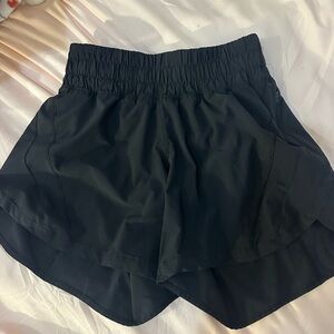 Lululemon size four tall black shorts!
